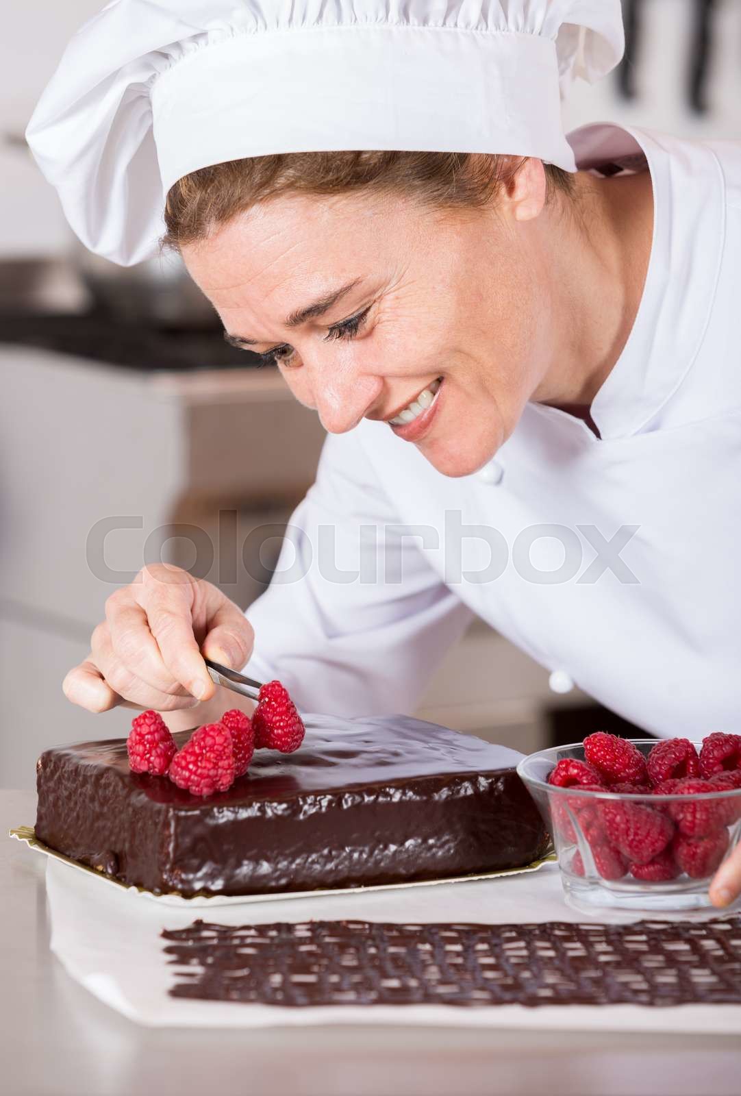 Pastry chef in the kitchen | Stock image | Colourbox