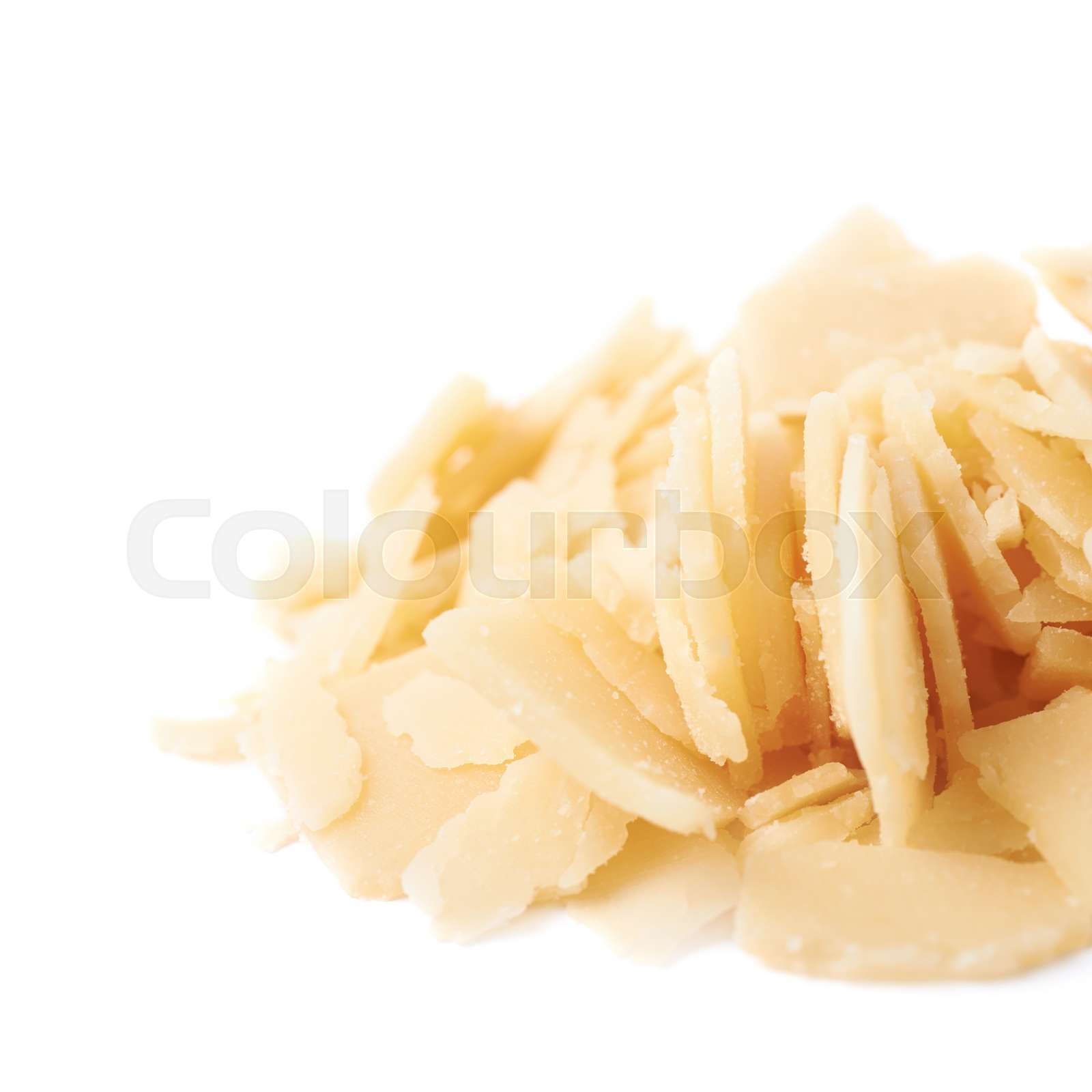 Pile of parmesan cheese flakes Stock image Colourbox