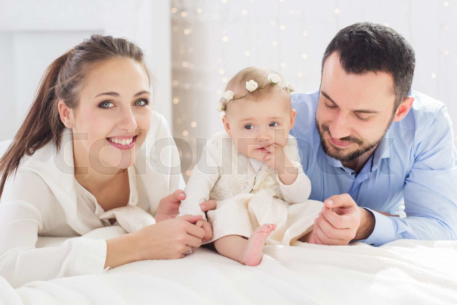 Happy Parents With Baby Girl Stock Image Colourbox