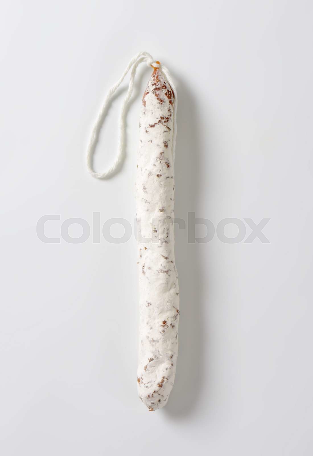 Spanish thin dried sausage Stock image Colourbox