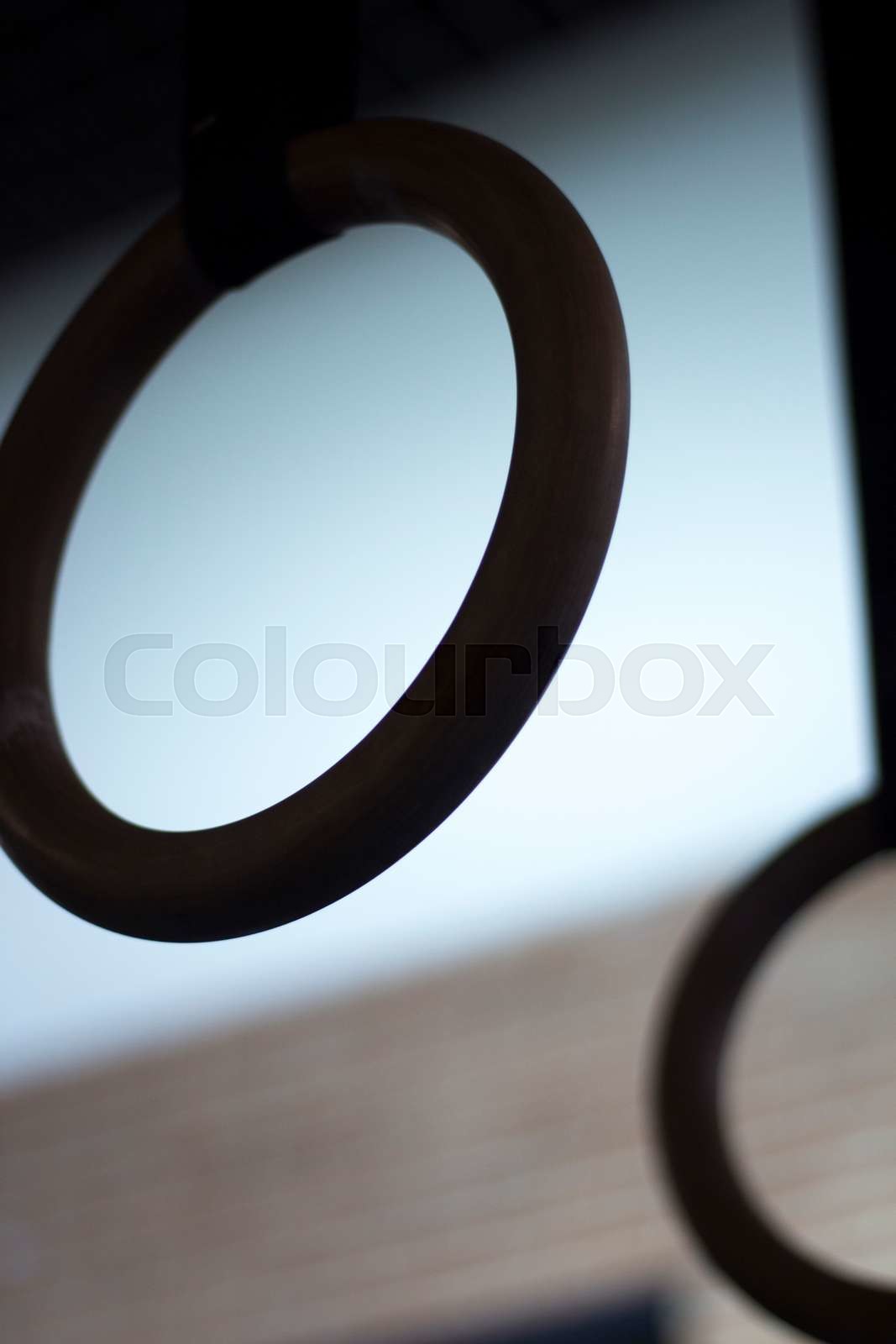 Olympic gymnasium rings in gym Stock image Colourbox