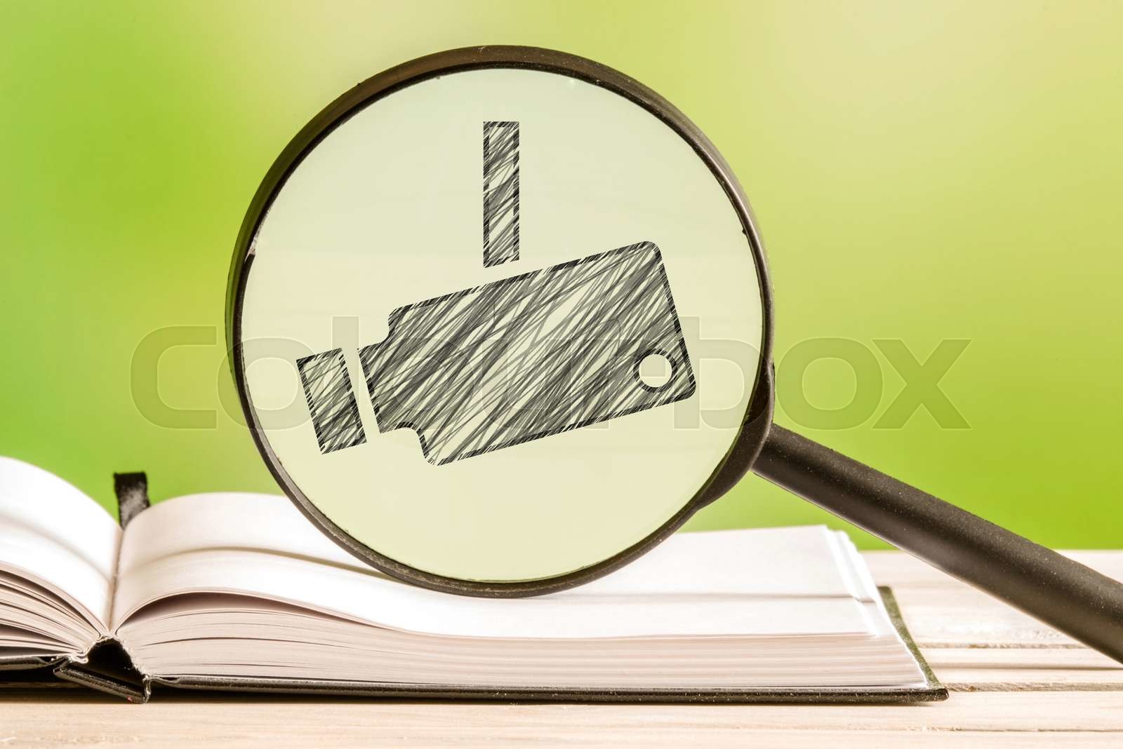 Surveillance investigation with a pencil drawing | Stock image | Colourbox