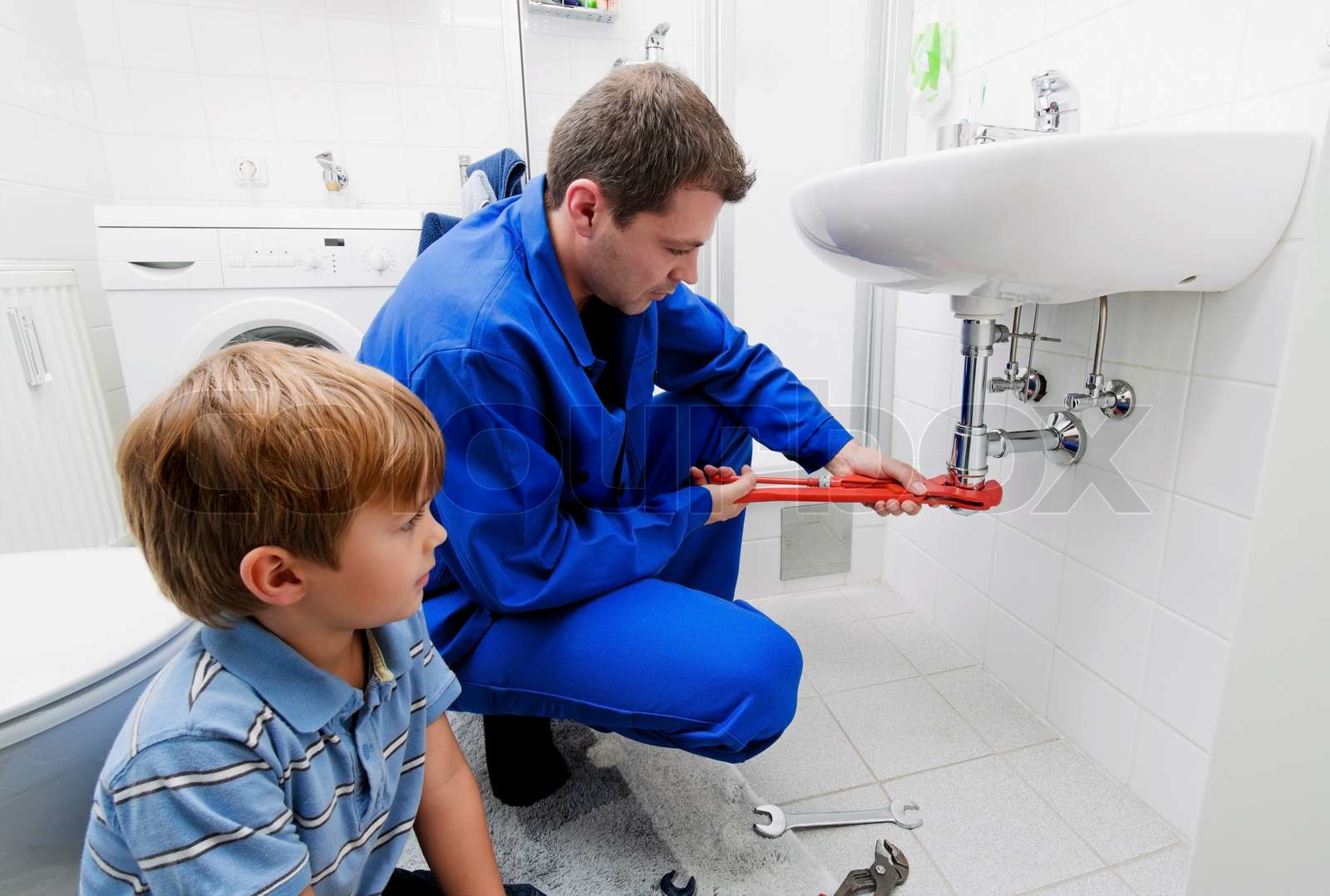 A plumbing repair a broken sink in bathroom | Stock image | Colourbox