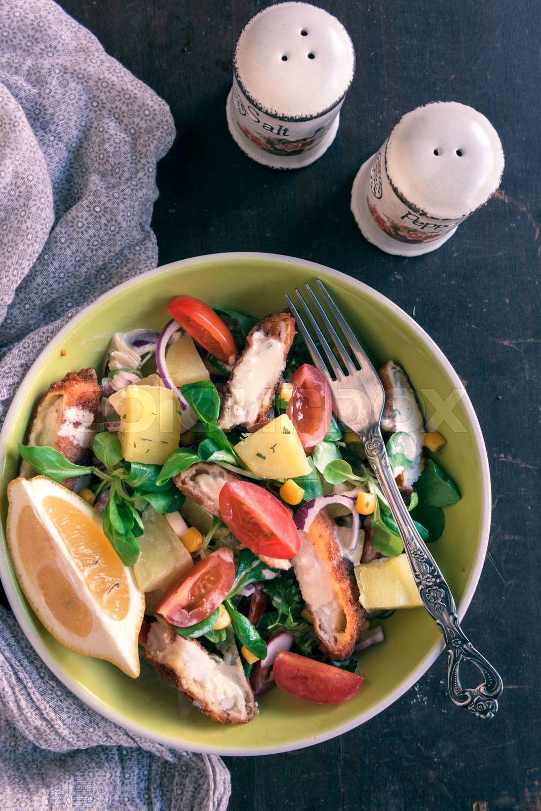 Salad and fried catfish Stock image Colourbox