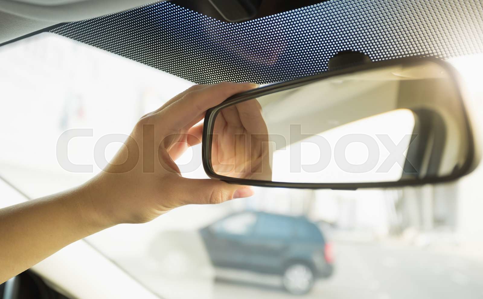 Closeup Of Driver Adjusting Rear View Mirror Stock Image Colourbox Closeup Of Driver Adjusting Rear View Mirror Stock Image Colourbox