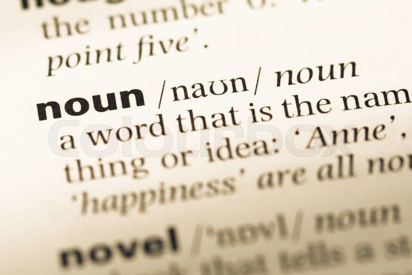 Close Up Of Old English Dictionary Page With Word Noun Stock Image