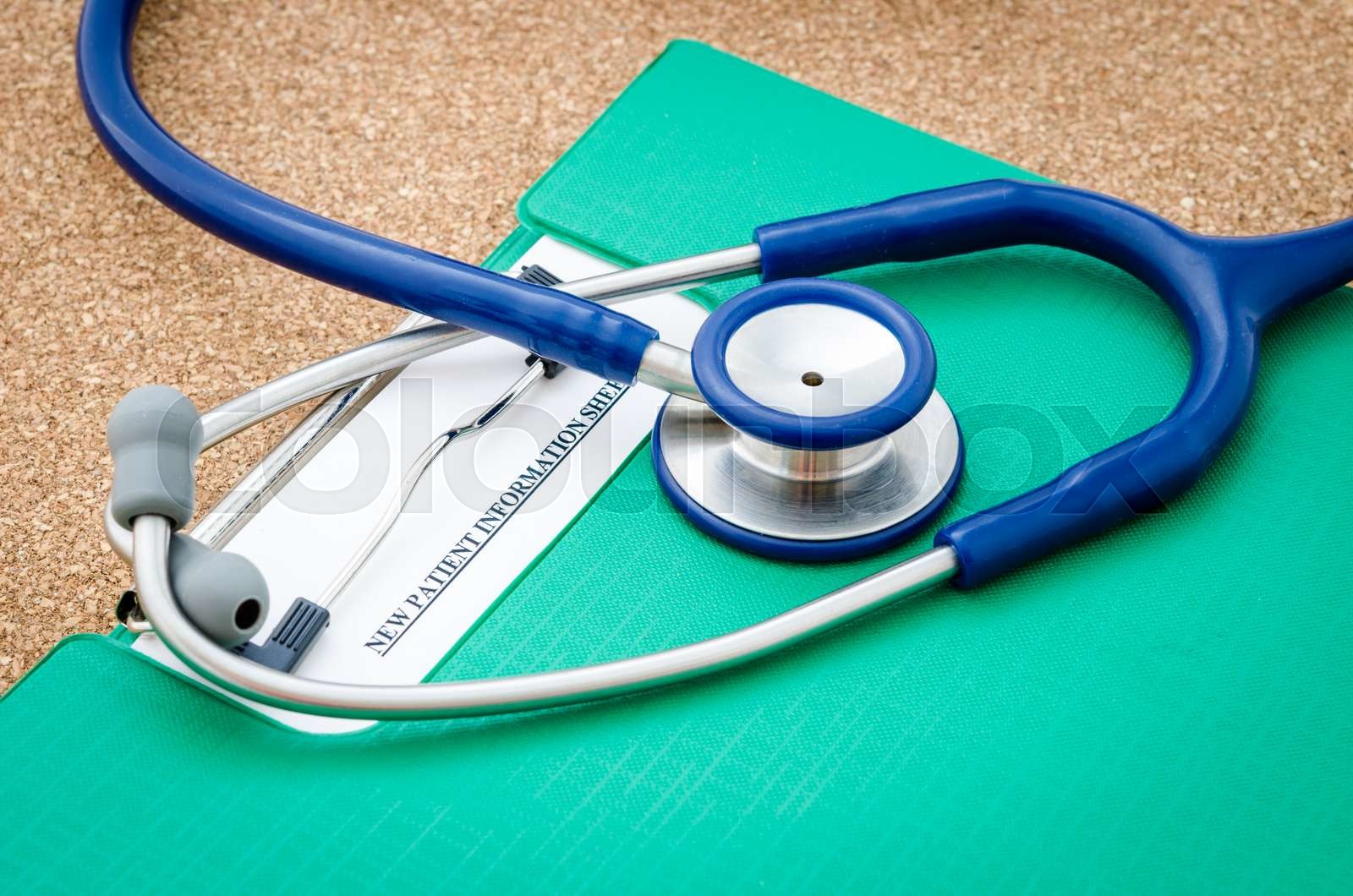 New patient record form with stethoscope medical. Stock image Colourbox