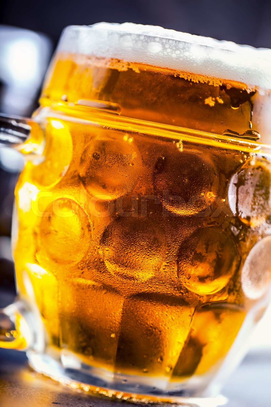 Beer. Two cold beers. Draft beer. Draft ale. Golden beer. Golden ale. Two gold beer with froth