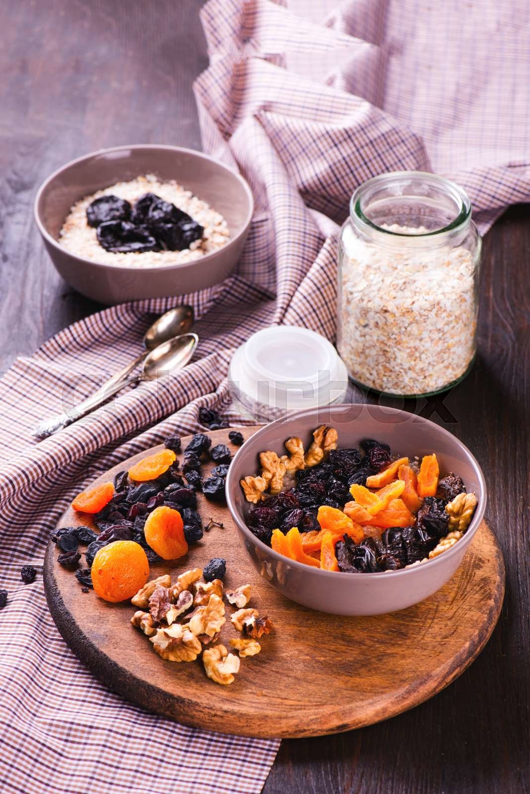 Oatmeal with raisins, dried apricots, plums Stock image Colourbox