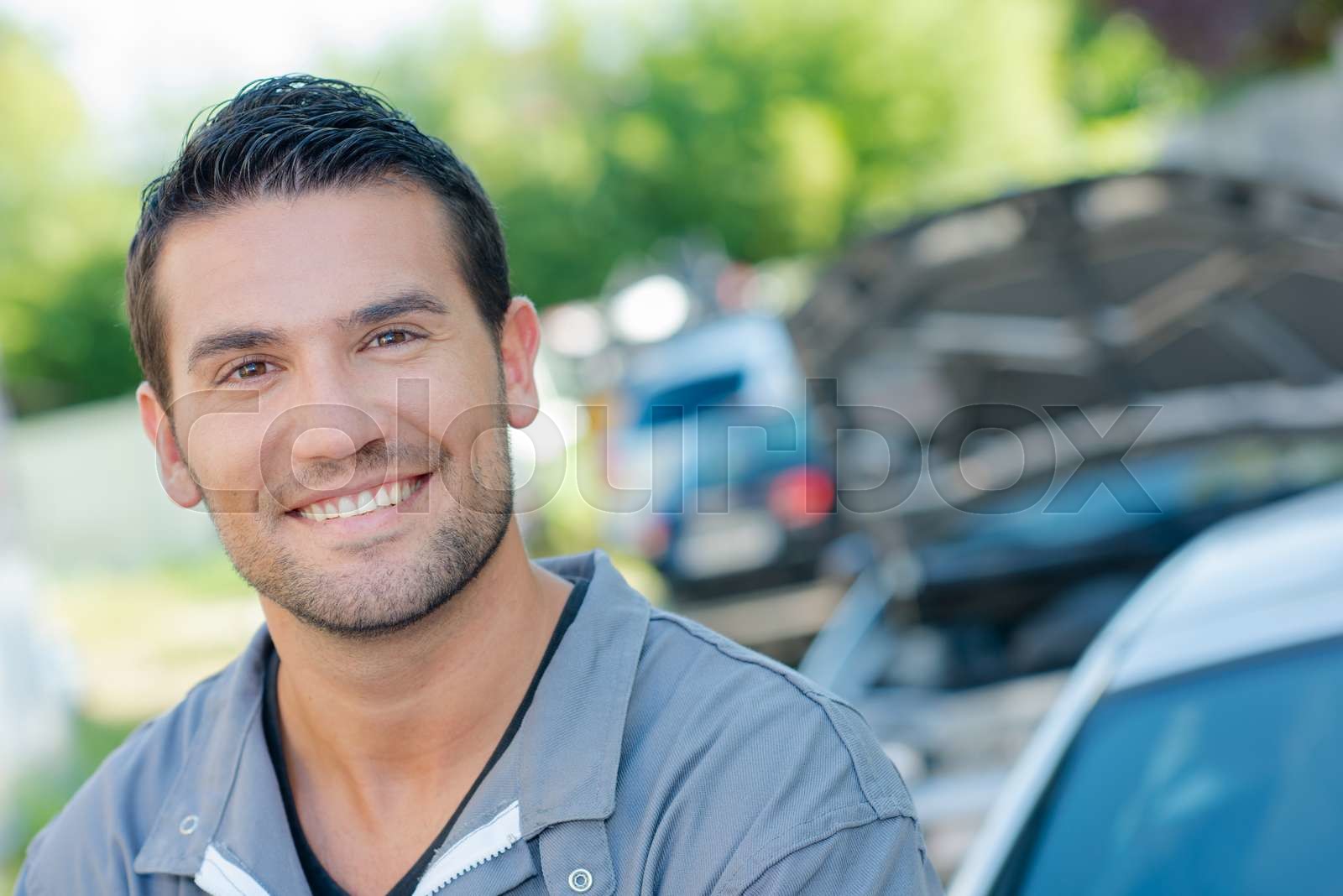 Smiling mechanic Stock image Colourbox