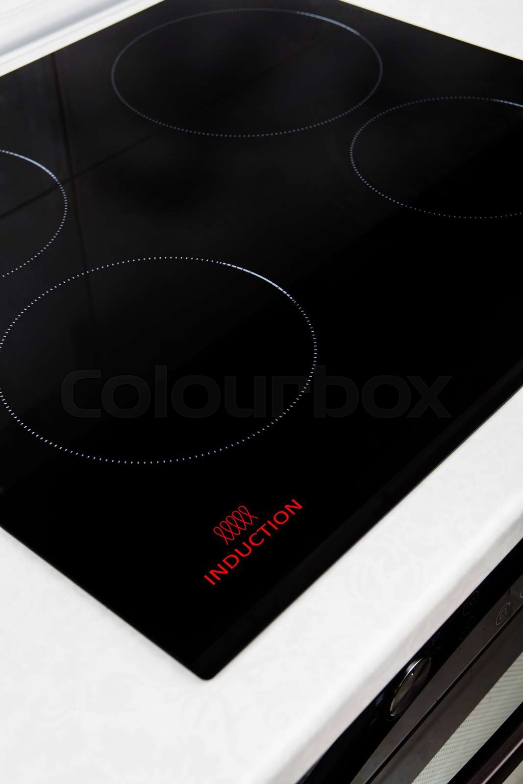 Induction symbol on electrical hob Stock image Colourbox