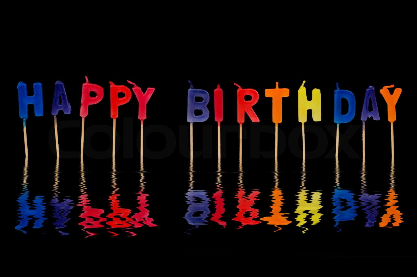 Happy birthday isolated on the black background | Stock image | Colourbox