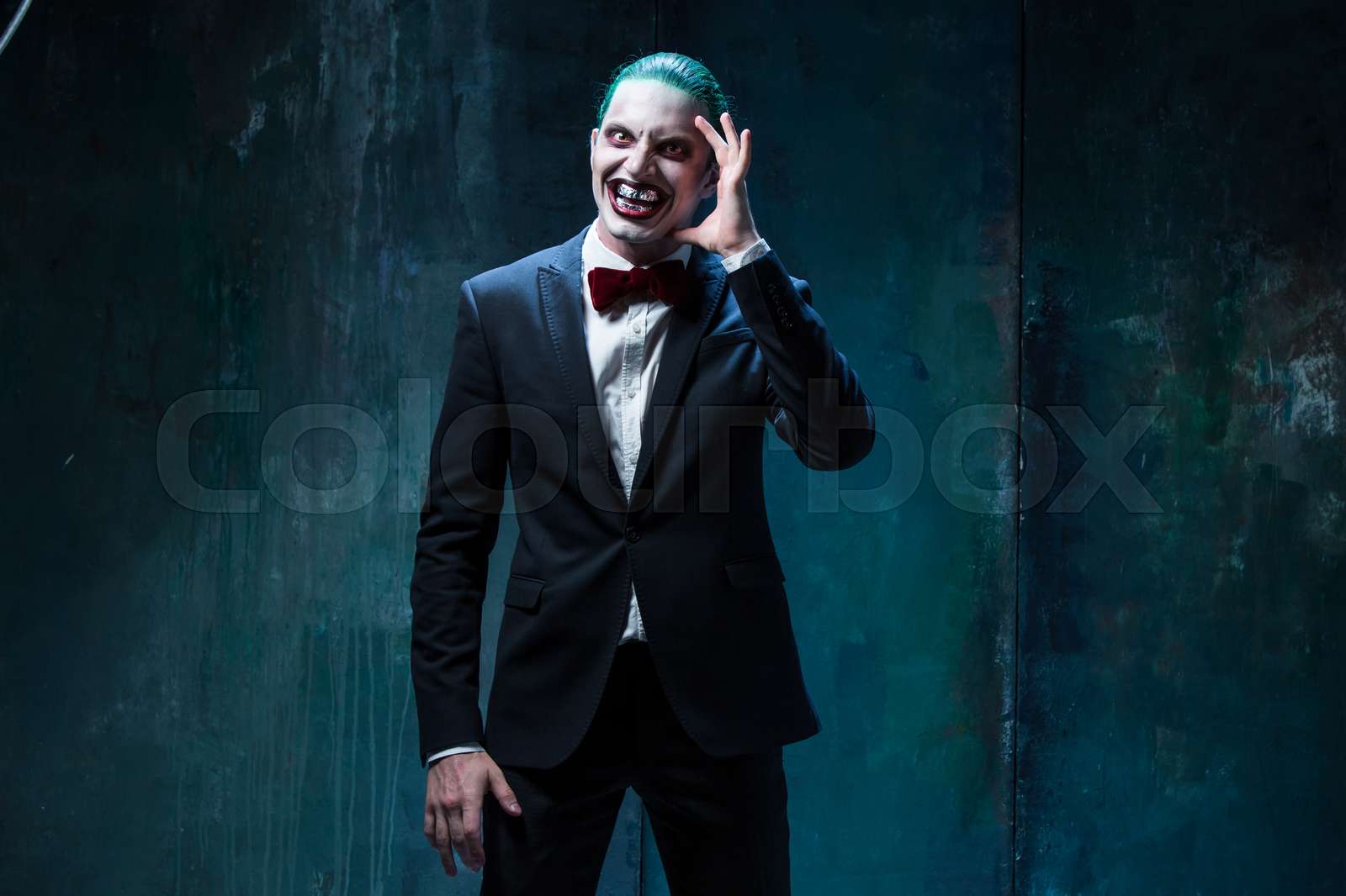 Bloody Halloween theme: crazy joker face | Stock image | Colourbox