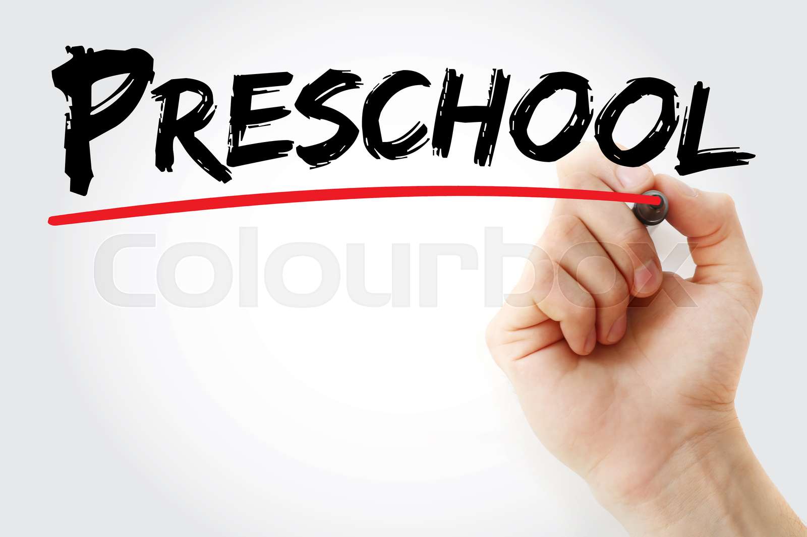 Hand writing Preschool with marker | Stock image | Colourbox
