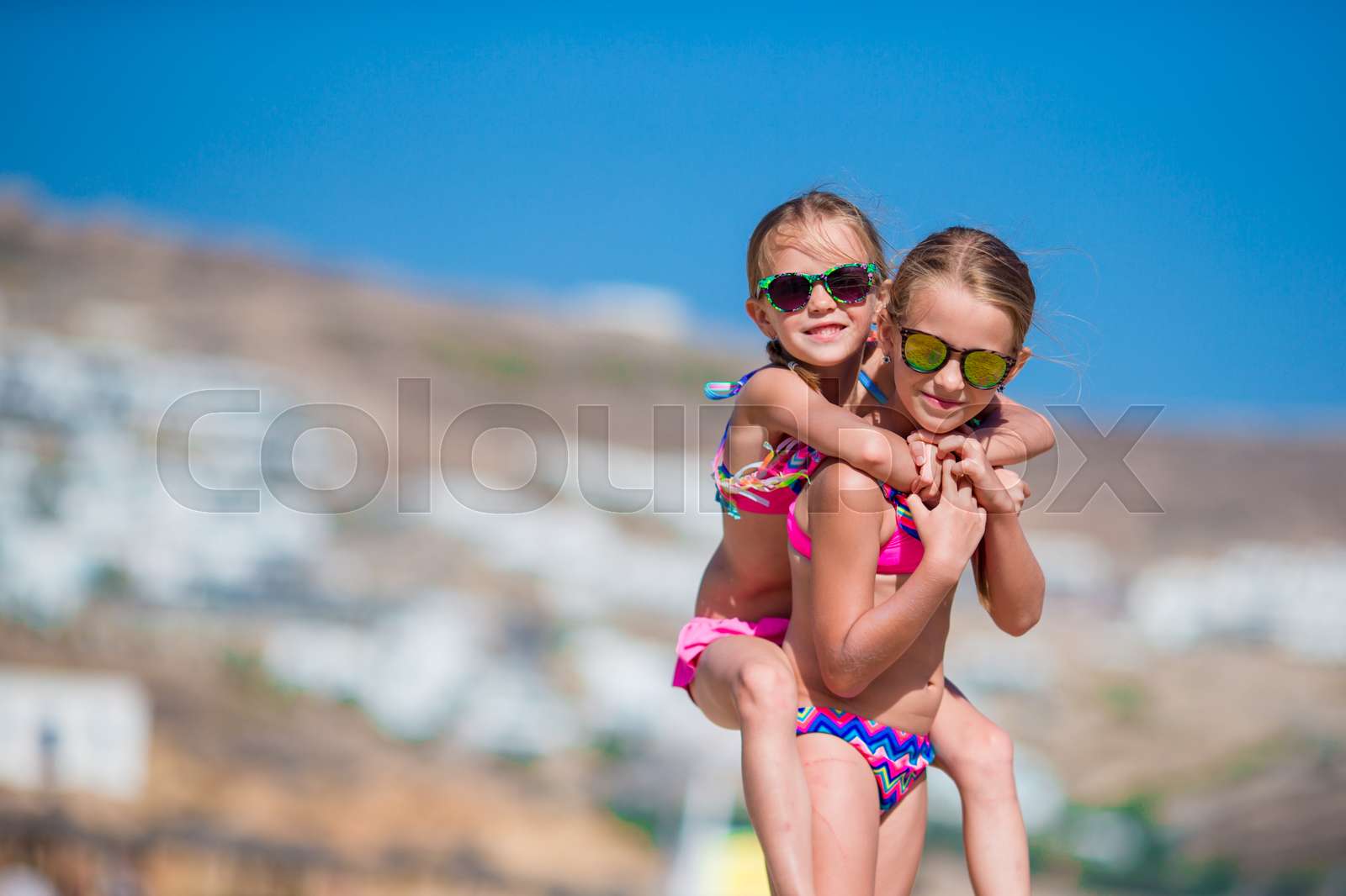Adorable Little Girls Having Fun During Beach Vacation Stock Image Adorable little girls having fun during beach vacation stock image