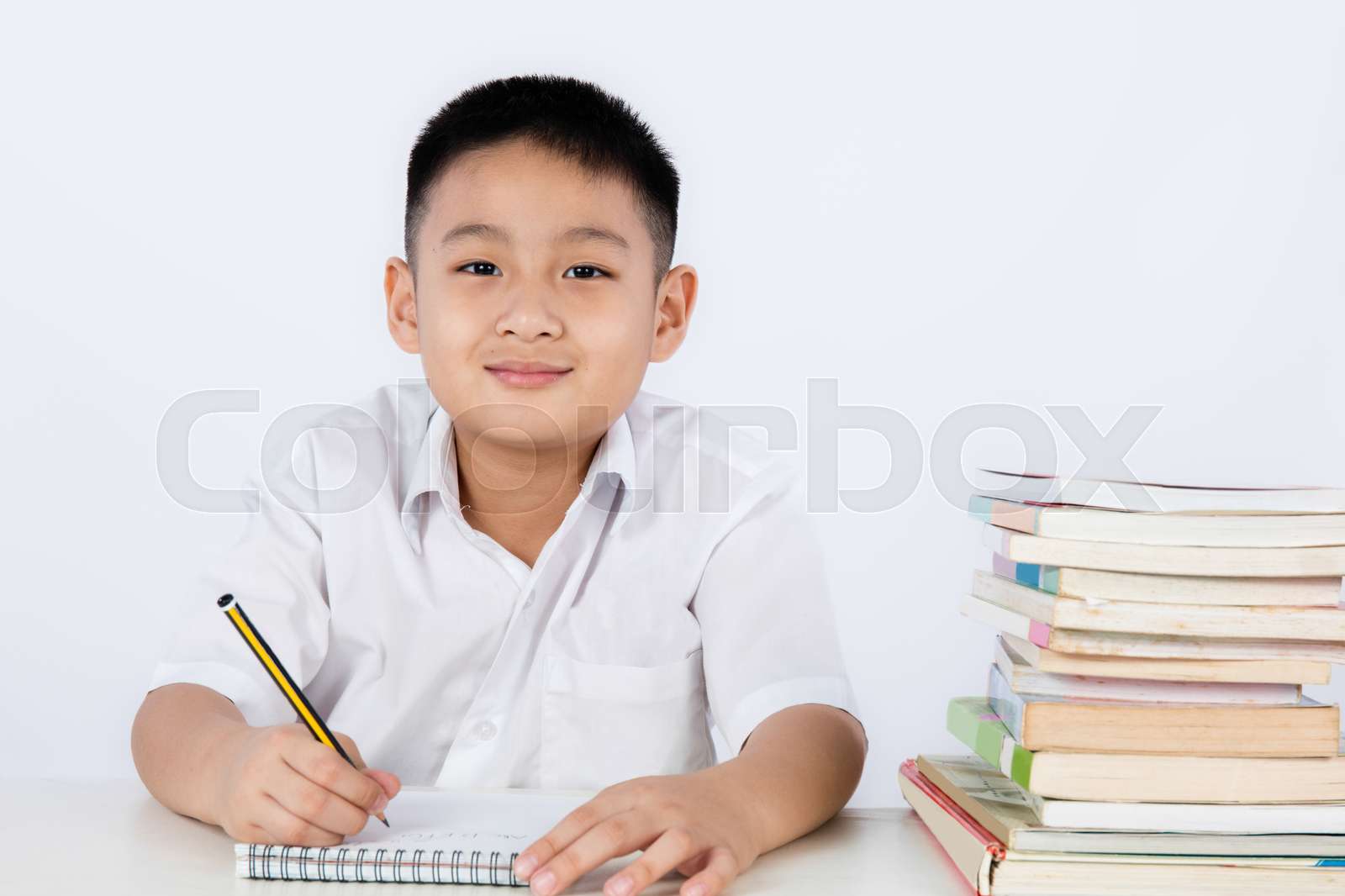 Asian Chinese Little Boy Wearing Student Uniform Writting Homework Stock Image Colourbox Asian Chinese Little Boy Wearing Student Uniform Writting Homework Stock Image Colourbox