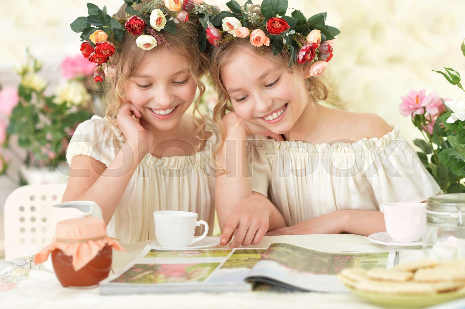 Tweenie Girls In Wreaths With Magazine Stock Image Colourbox Tweenie Girls In Wreaths With Magazine Stock Image Colourbox