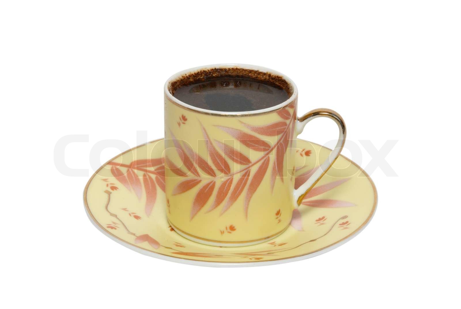 Coffee cup with saucer isolated on white. Stock image Colourbox