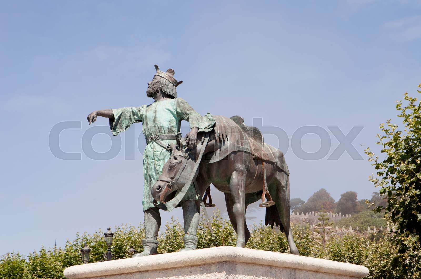 Bronze sculpture of a king with his horse. Stock image Colourbox