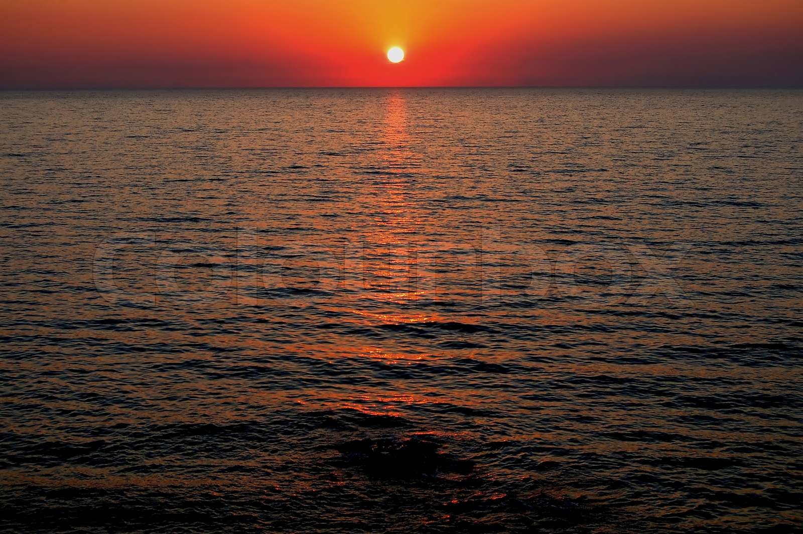 red sunset beach on the Black Sea at Sevastopol | Stock image | Colourbox