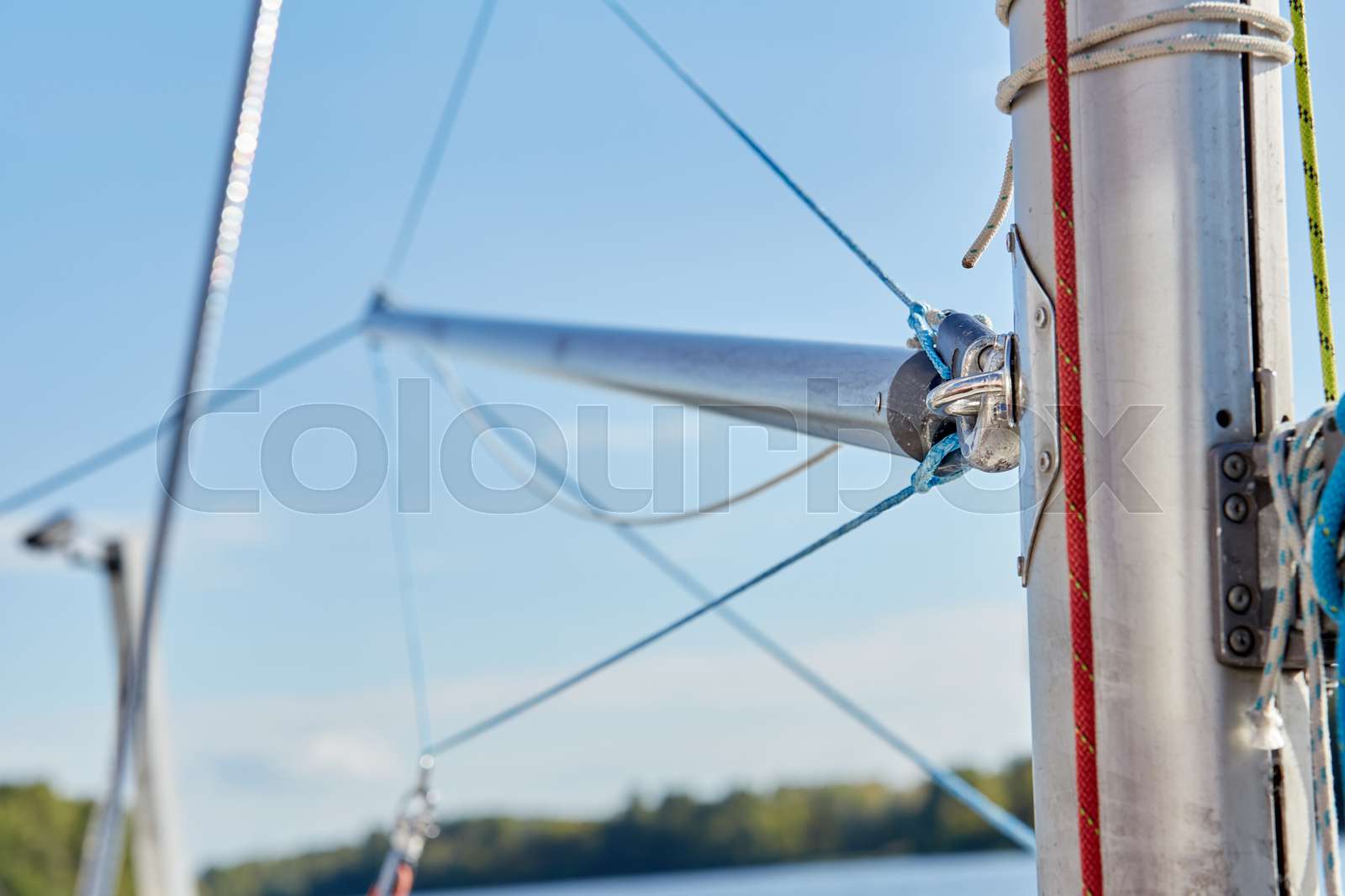 spinnaker pole is a spar used in sailboats | Stock image | Colourbox