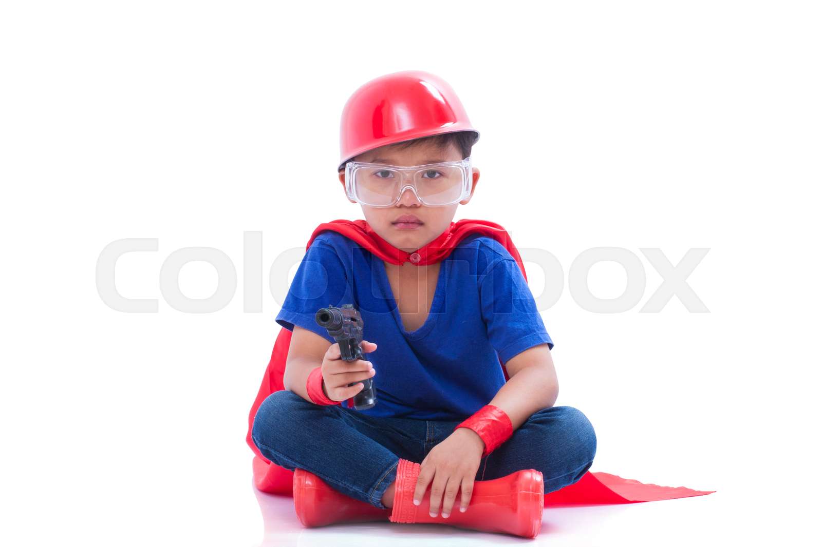 Child pretending to be a superhero | Stock image | Colourbox