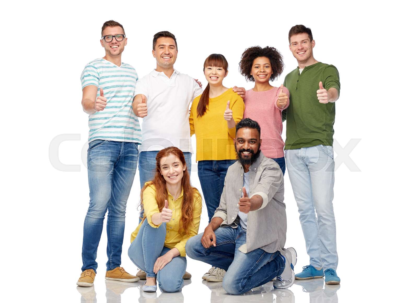 international group of people showing thumbs up Stock image Colourbox