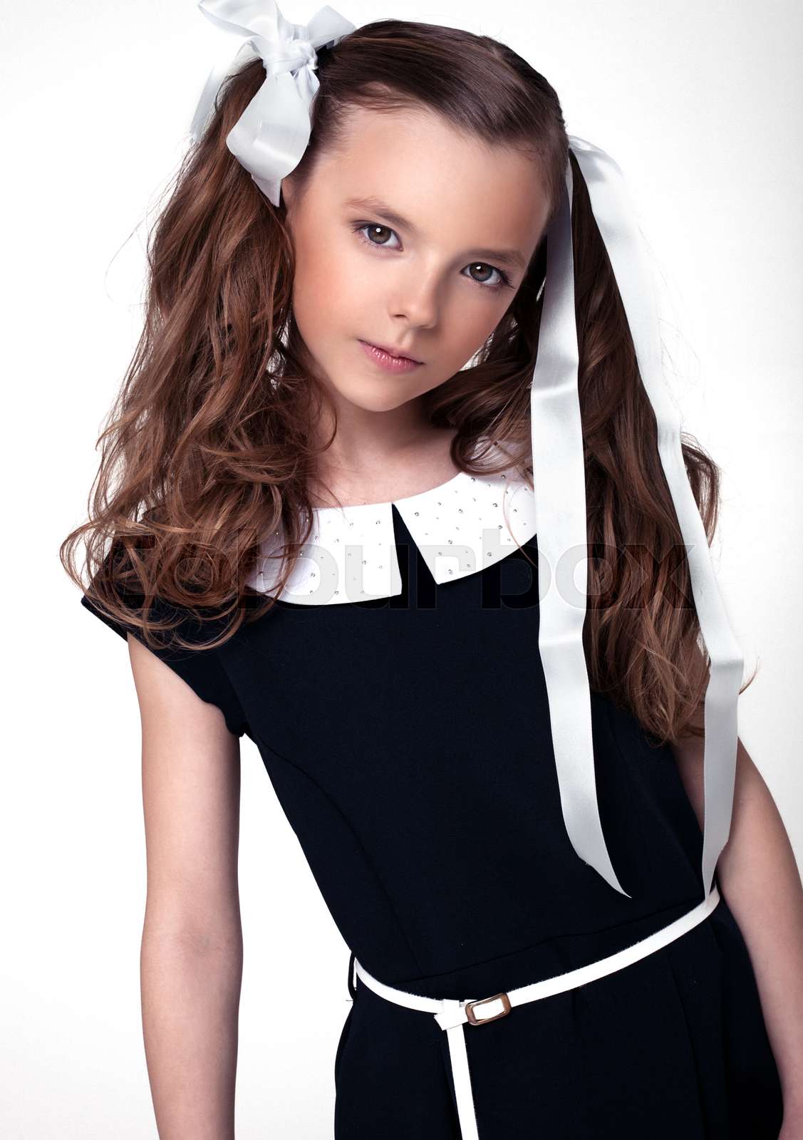 klein, girl, uniform | Stock Bild | Colourbox