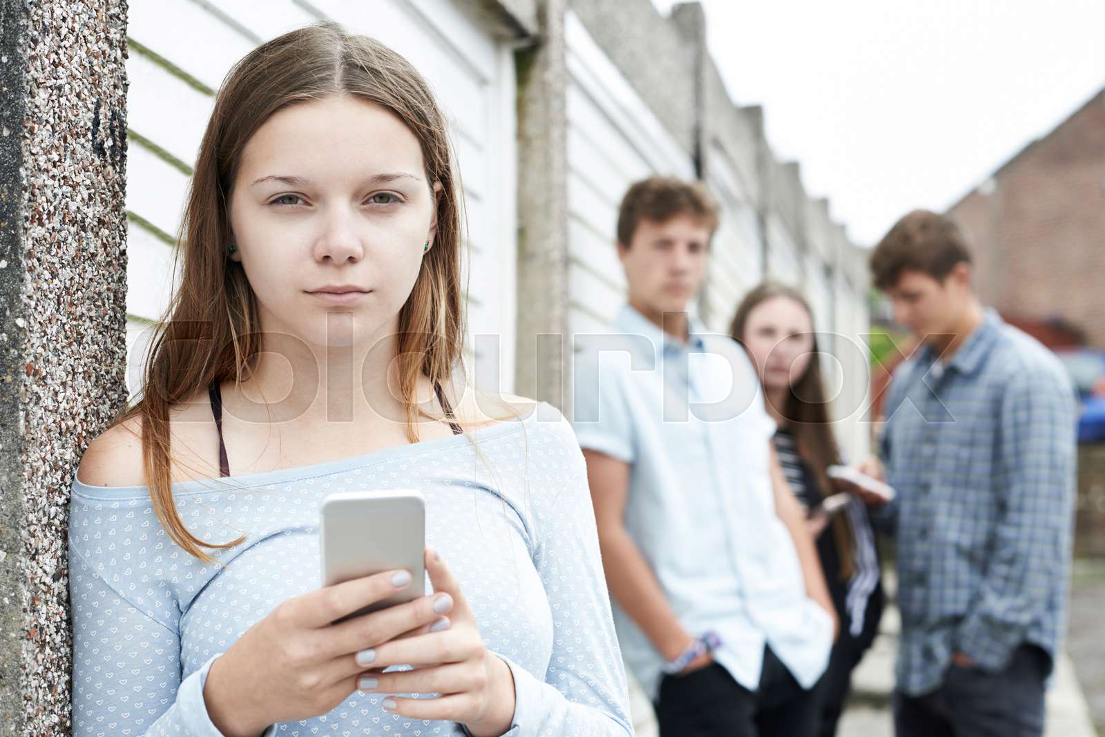 Teenage Girl Victim Of Bullying By Text Messaging Stock Image Colourbox Teenage girl victim of bullying by text messaging stock image colourbox