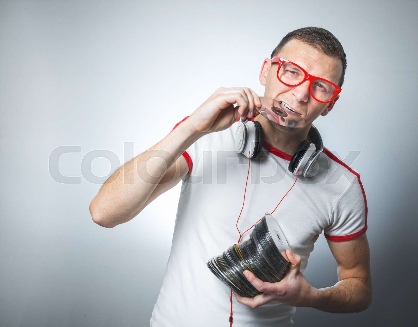 Funny dj with cds Stock image Colourbox