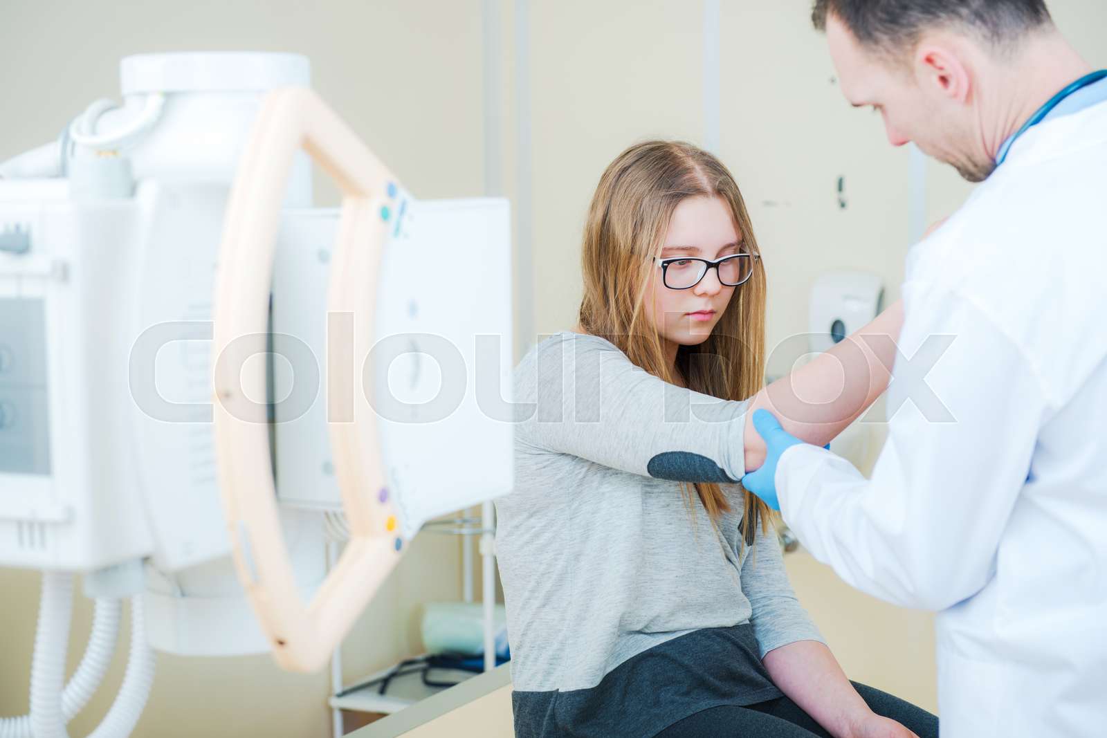Doctor Examining Broken Arm Stock image Colourbox