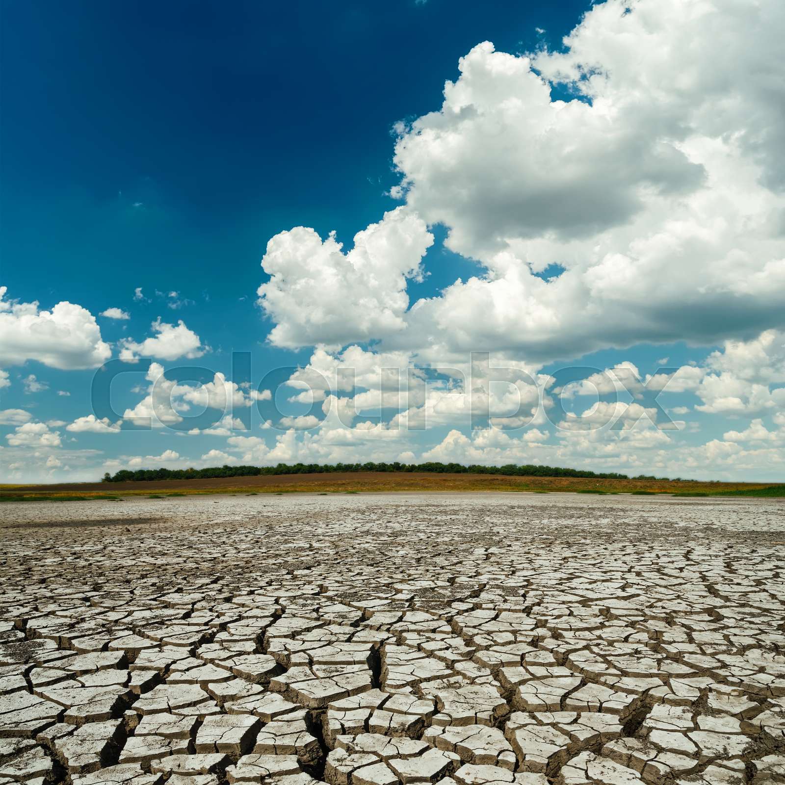 Dramatic Sky With Low Clouds Over Drought Earth Stock Image Colourbox