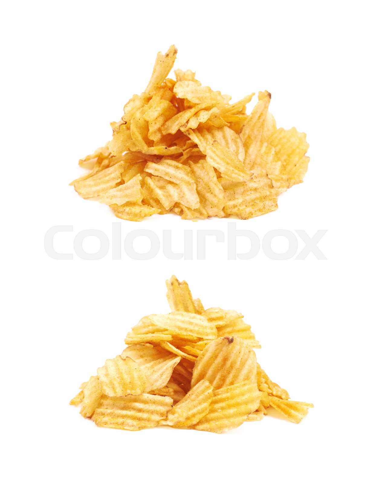 Pile of potato chips isolated Stock image Colourbox