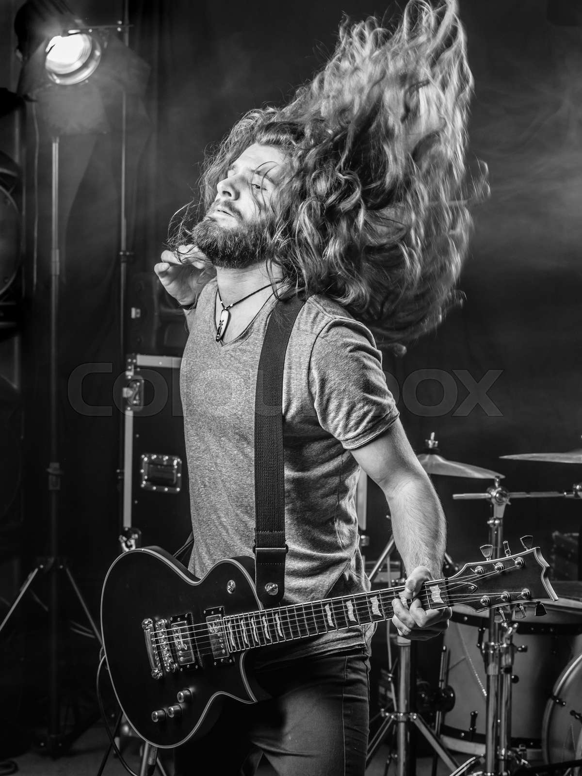 Playing heavy metal on stage | Stock image | Colourbox