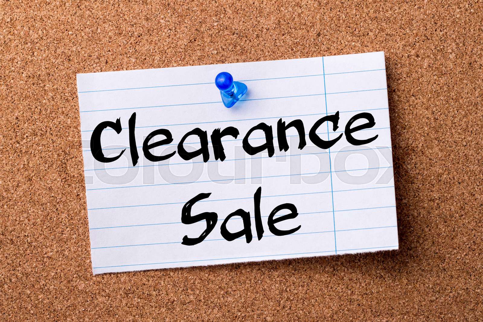 Clearance Sale - teared note paper pinned on bulletin board | Stock