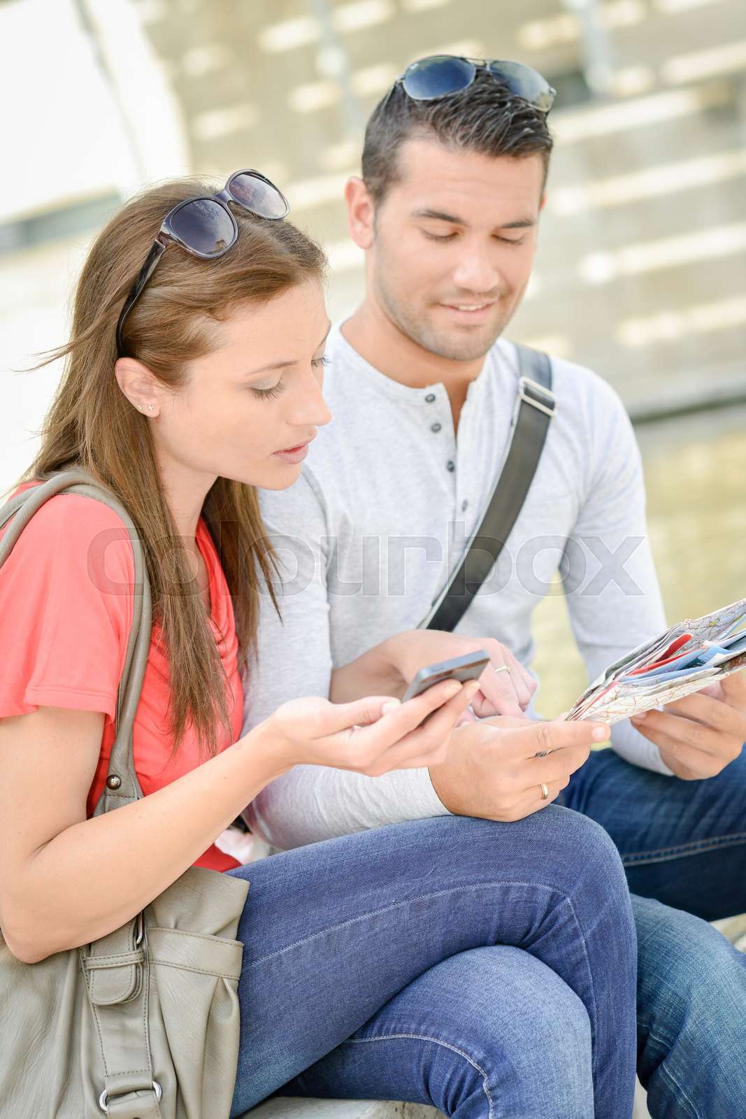 Couple looking for directions Stock image Colourbox