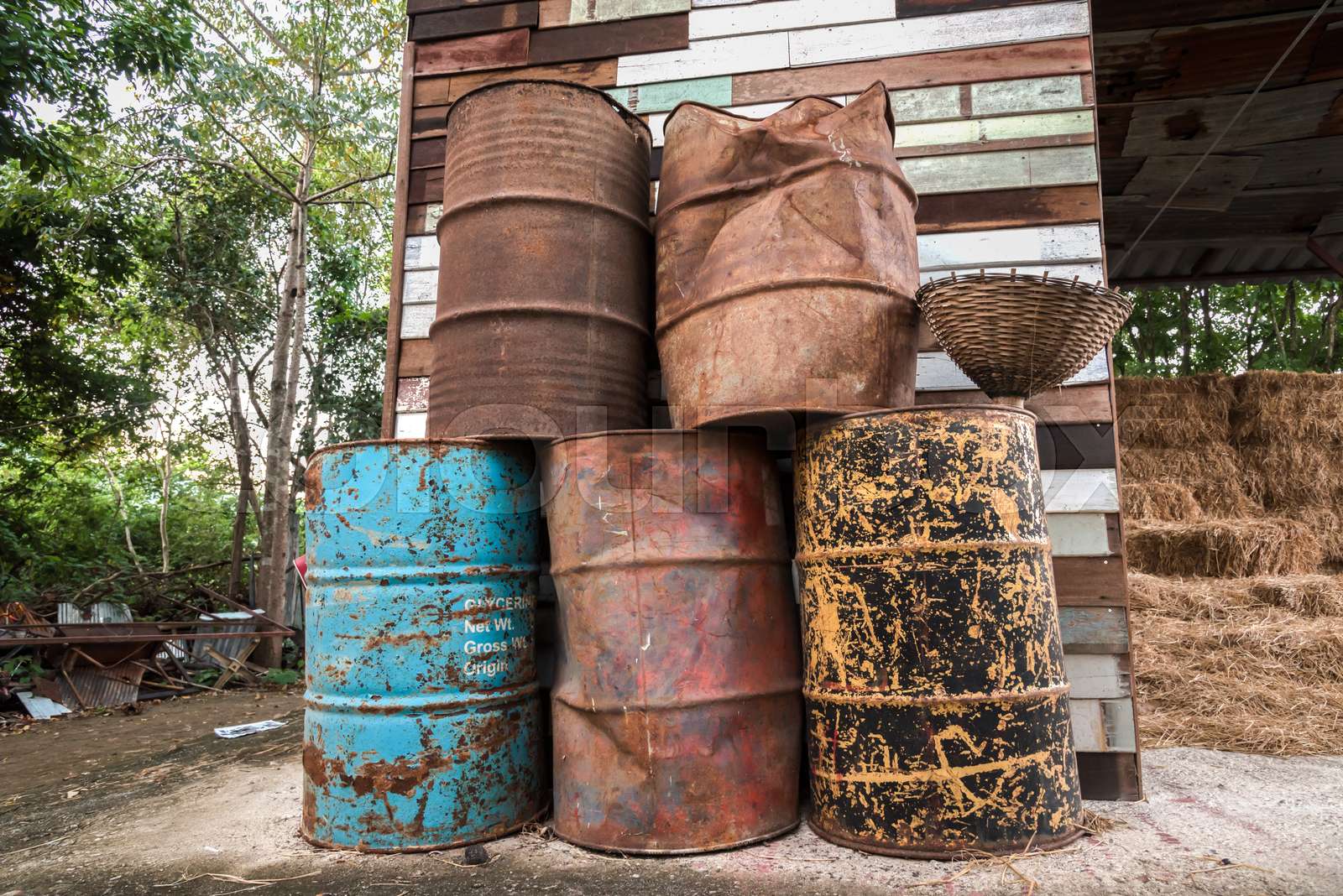 The old oil tanks are overlap next the barnyard Stock image Colourbox