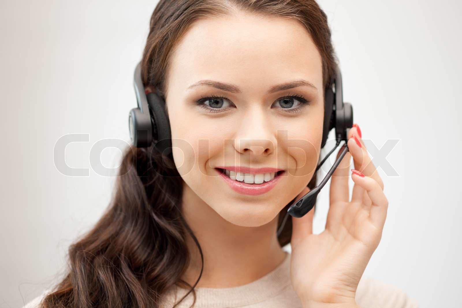 Bright Picture Of Friendly Female Helpline Operator Stock Image bright-picture-of-friendly-female-helpline-operator-stock-image