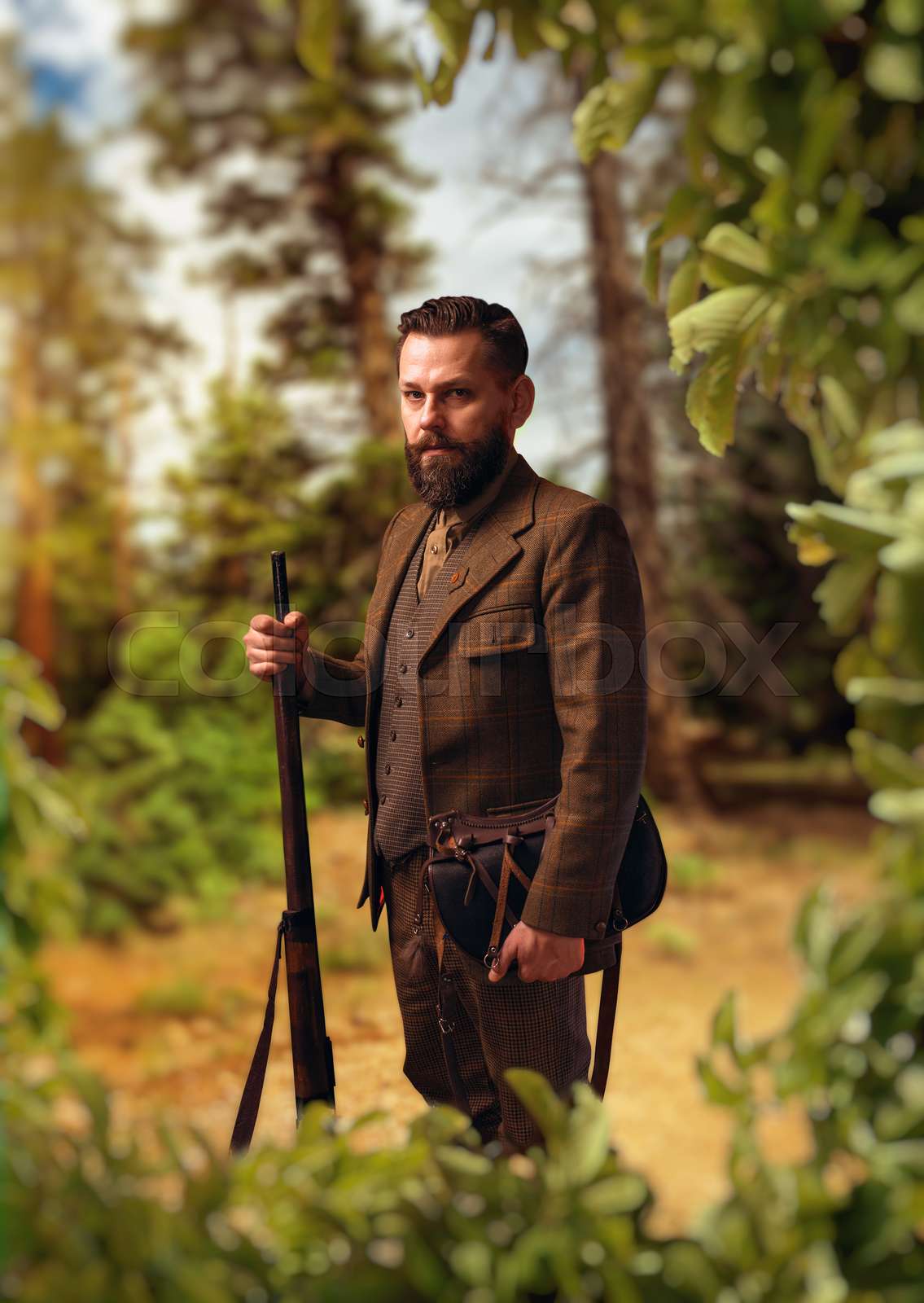 Portrait of hunter in traditional hunting clothing | Stock image ...
