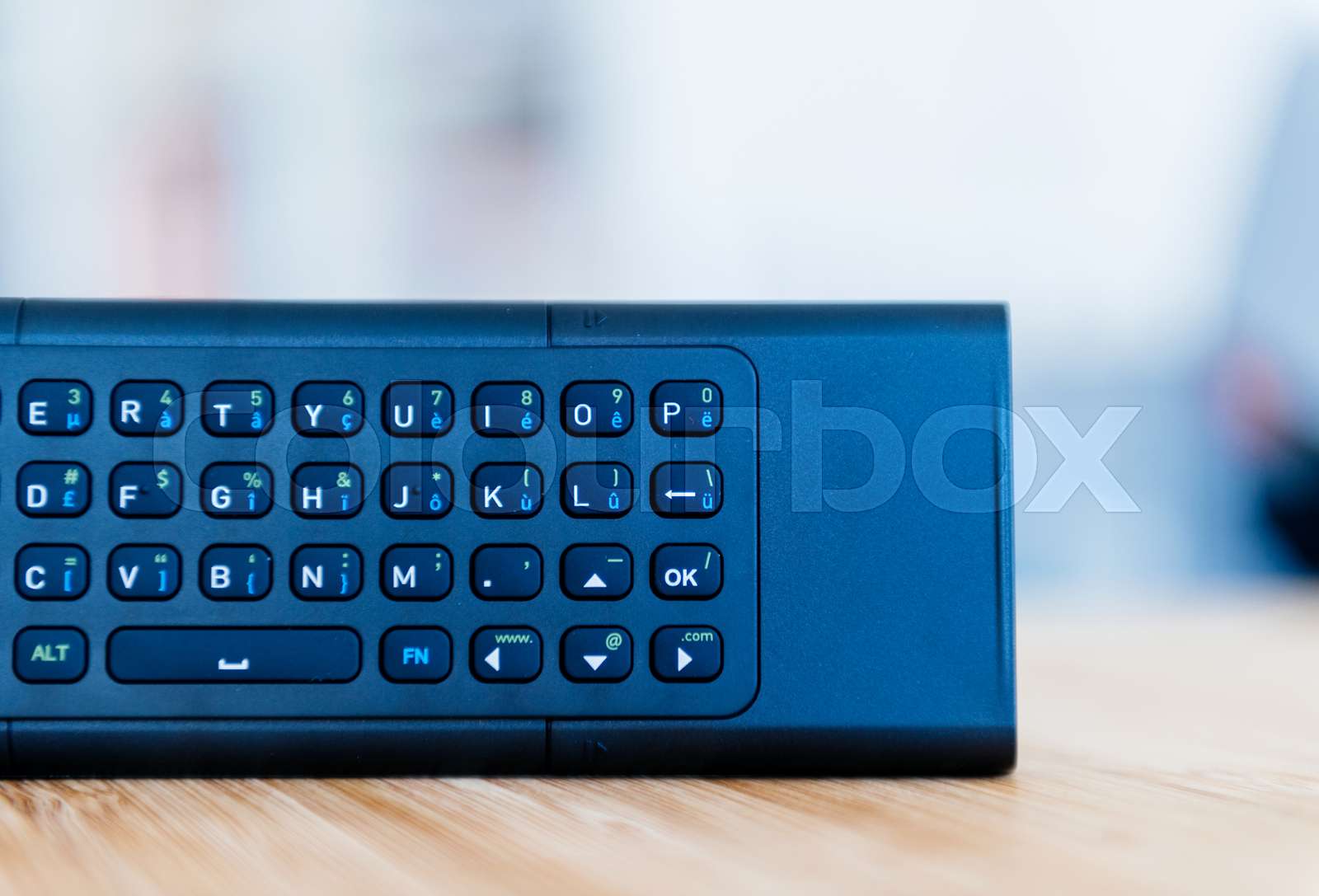 Modern remote control with full qwerty keyboard Stock image Colourbox