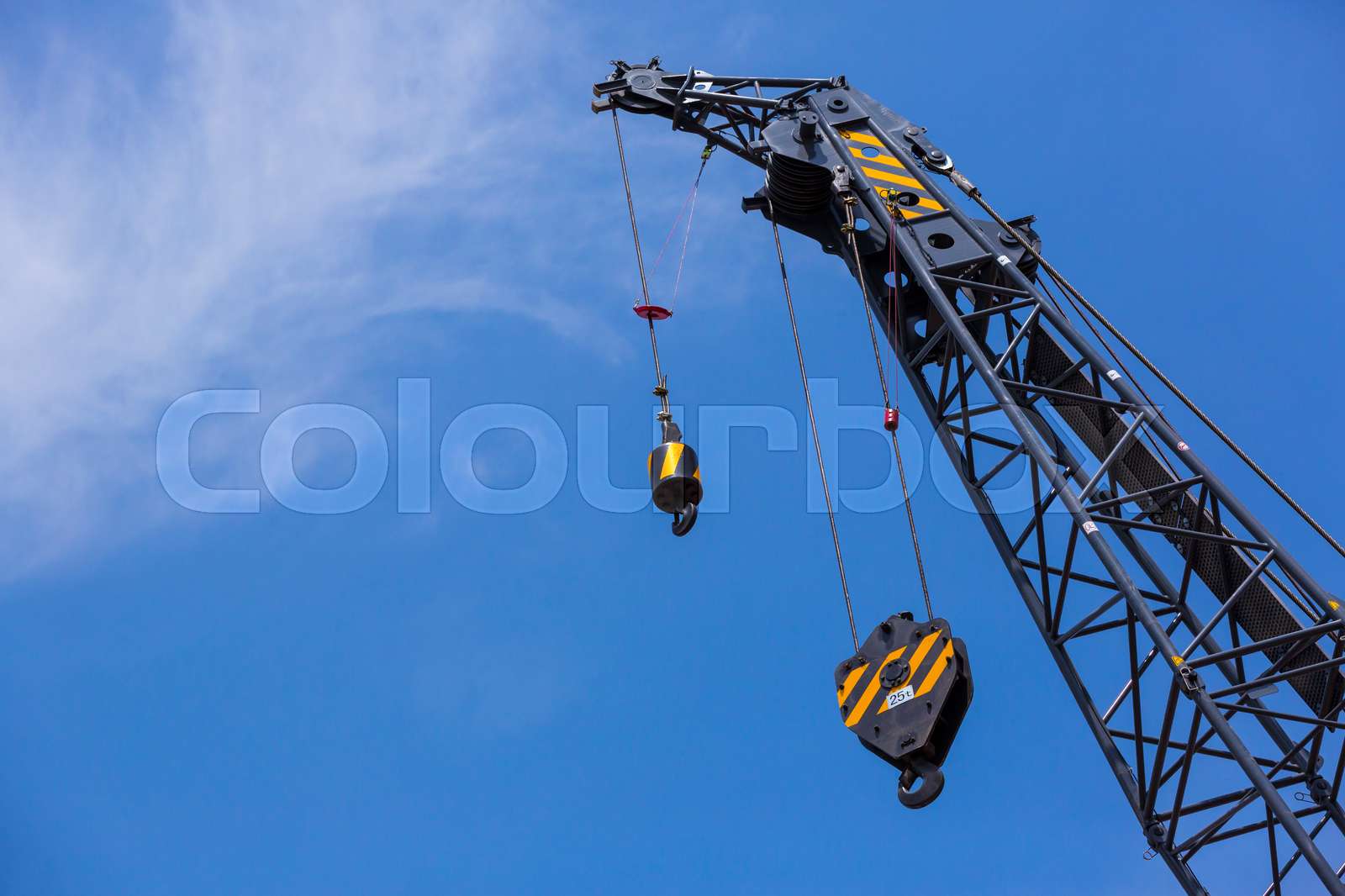 Mechanism of a crane with a hook for lifting loads Stock image