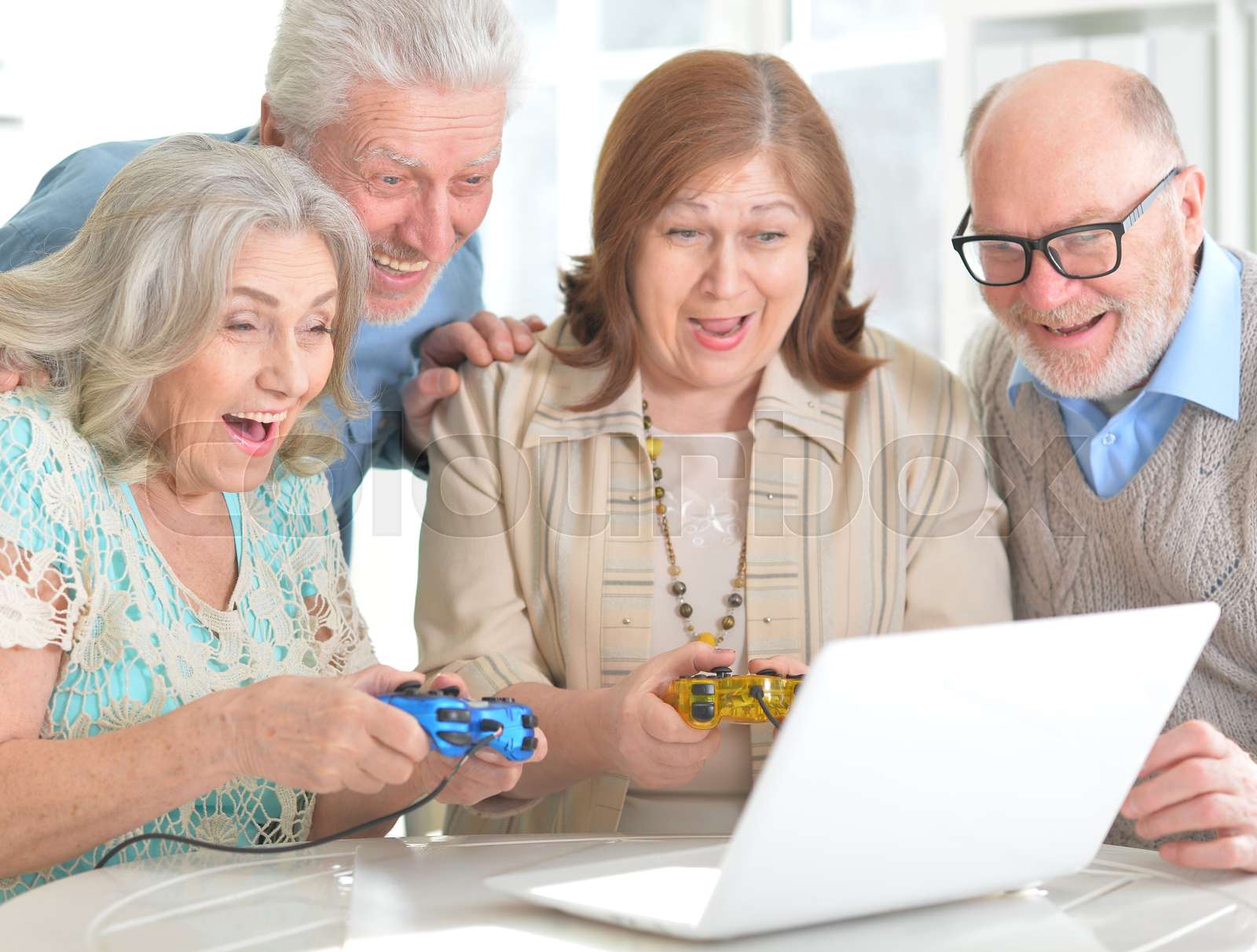 Old people playing board games | Stock image | Colourbox