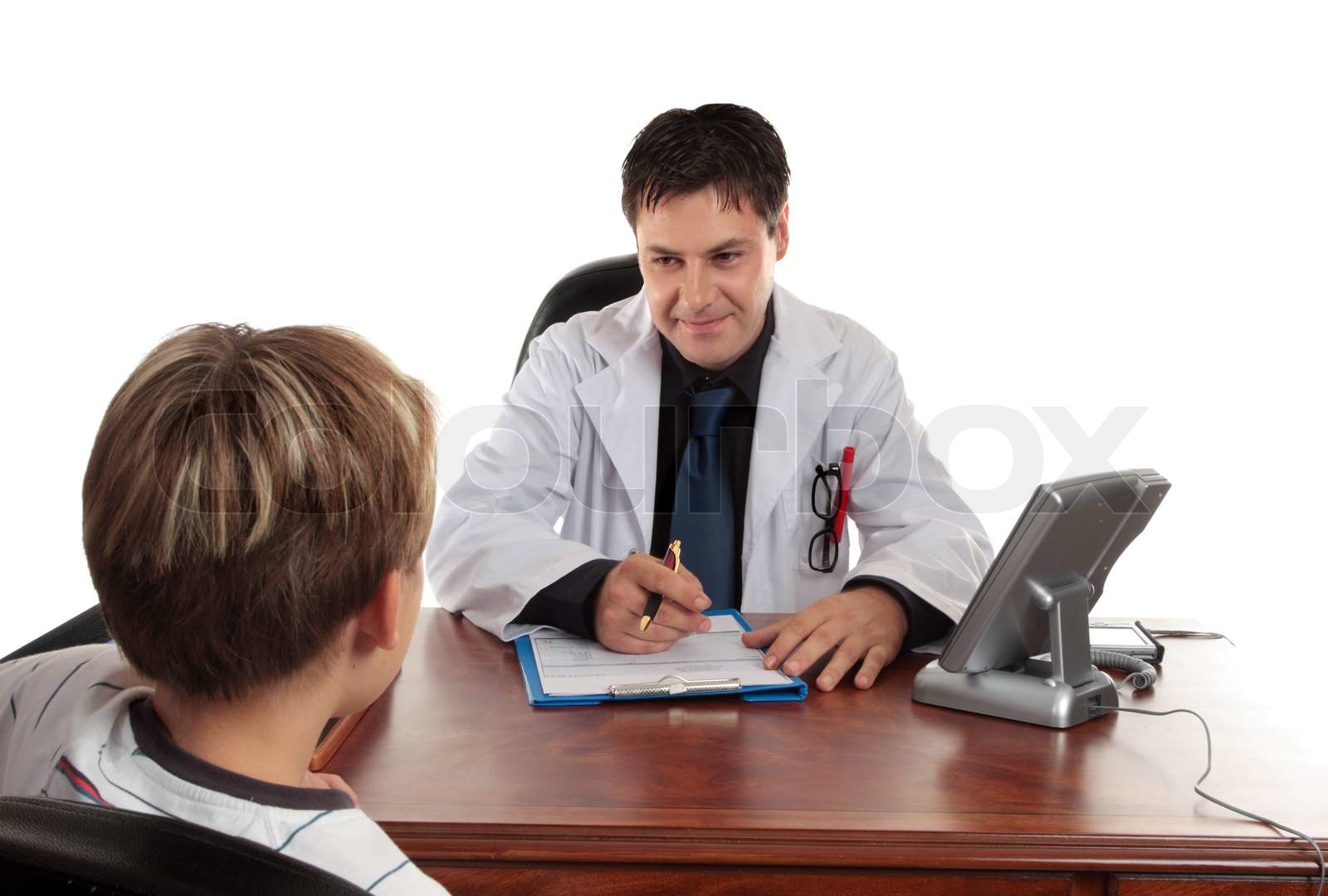 Eine Kinderarzt Arzt in Absprache mit einem Kind Patienten Stock Bild Colourbox