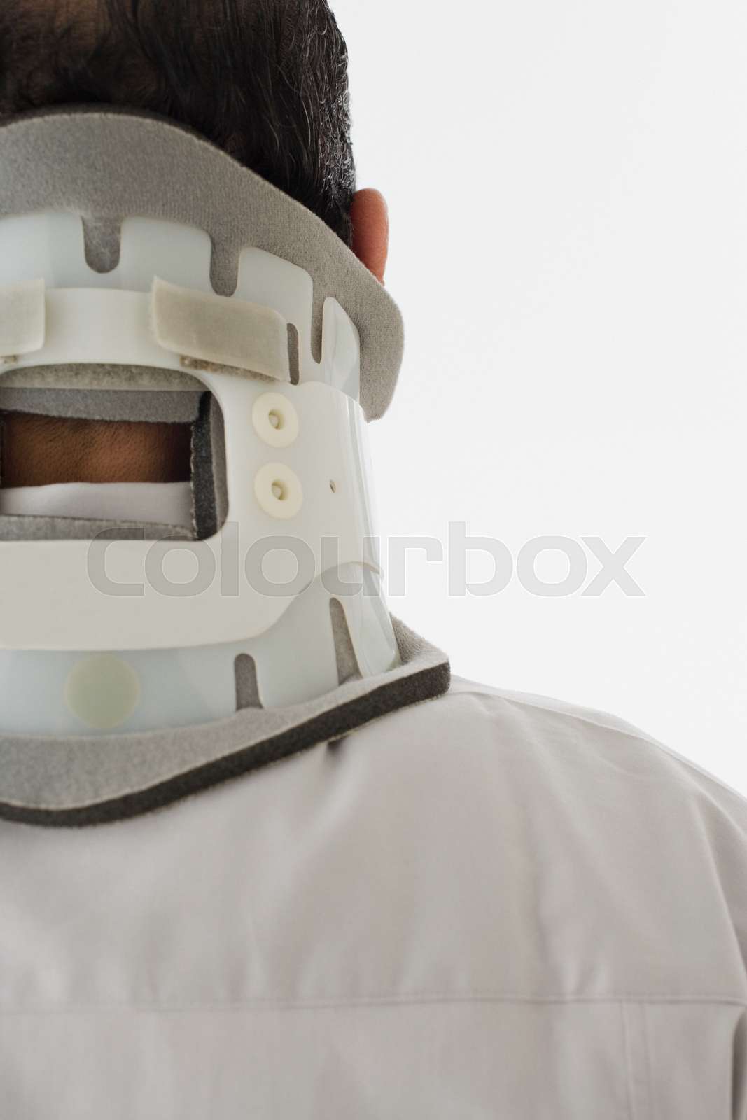 Man wearing a neck brace Stock image Colourbox