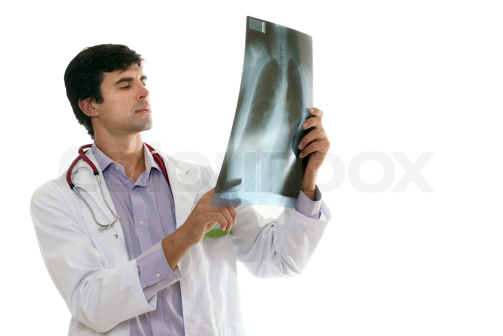 Doktor Beurteilung eines Patienten Röntgen-Thorax | Stock Bild | Colourbox