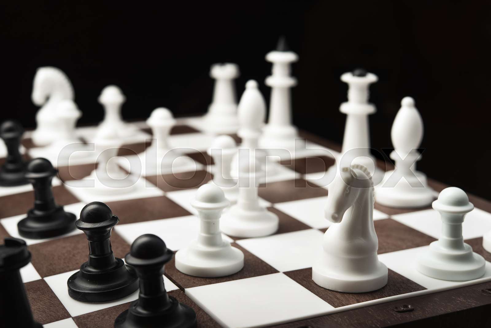 White and black chess pieces | Stock image | Colourbox
