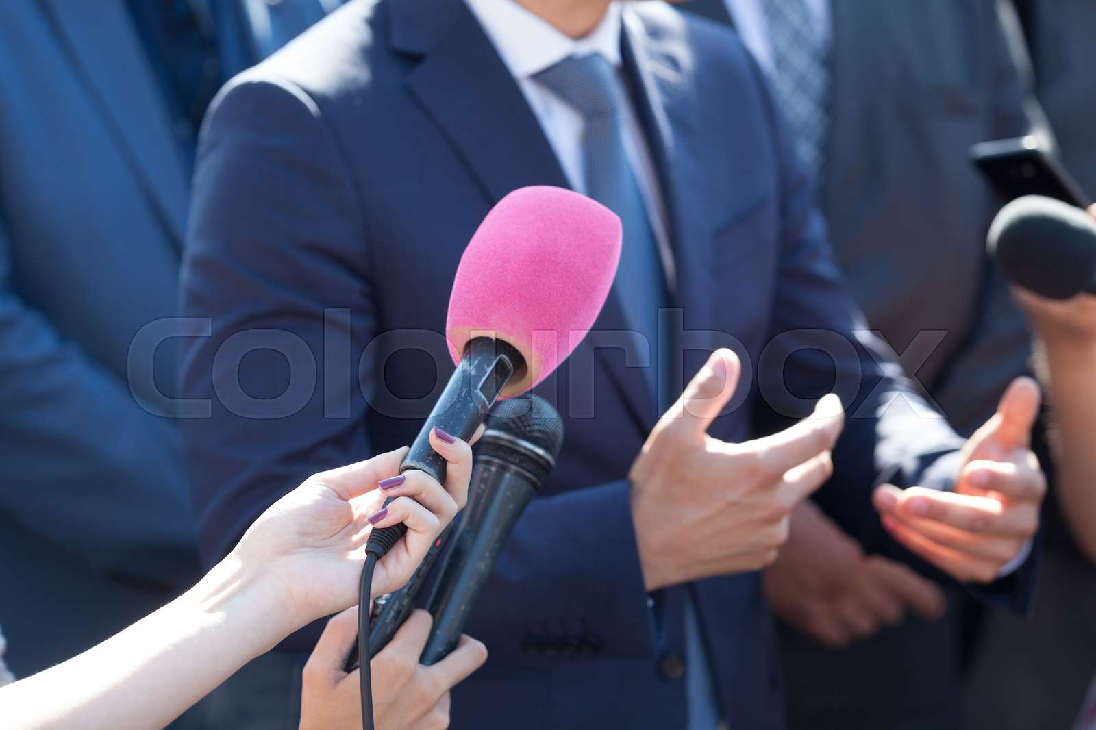 Media interview. Hand gesture. Business person or politician. | Stock ...