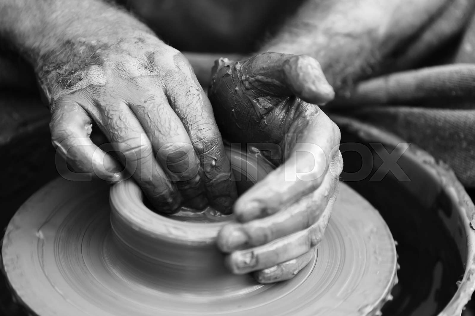 Potter making ceramic pot on the pottery wheel Stock image Colourbox