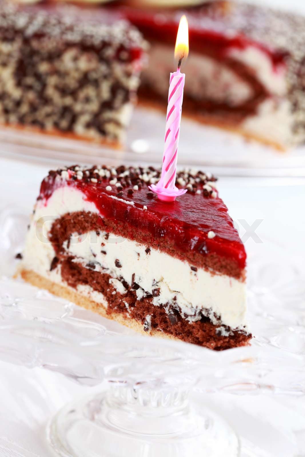Delicious stracciatella birthday cake with candle | Stock image | Colourbox