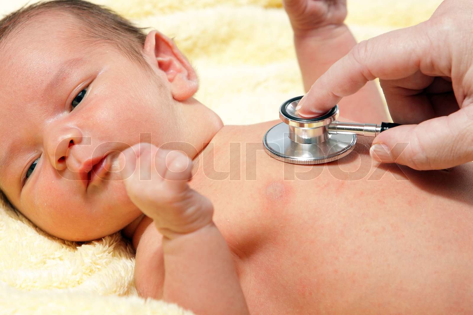 Stethoskop hört ein Baby Herz höher schlagen Stock Bild Colourbox